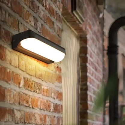 Modern black capsule flush wall sconce wall-mounted lamp with warm white illuminated panel for bedroom lighting