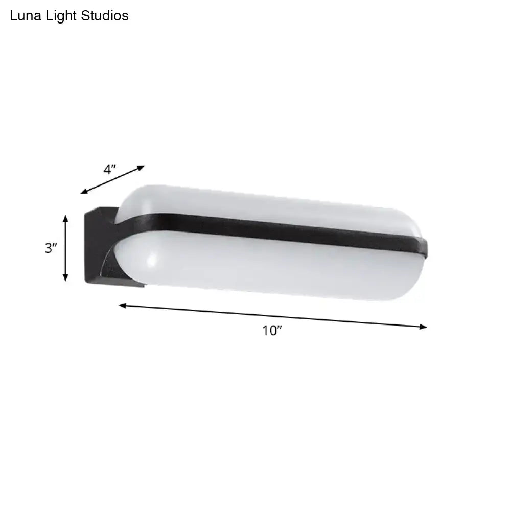 Modern black capsule flush wall sconce wall-mounted lamp with white frosted glass diffuser and black metal frame, 10 inches long