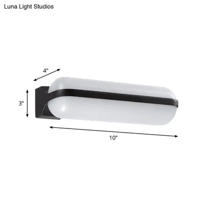 Modern black capsule flush wall sconce wall-mounted lamp with white frosted glass diffuser and black metal frame, 10 inches long