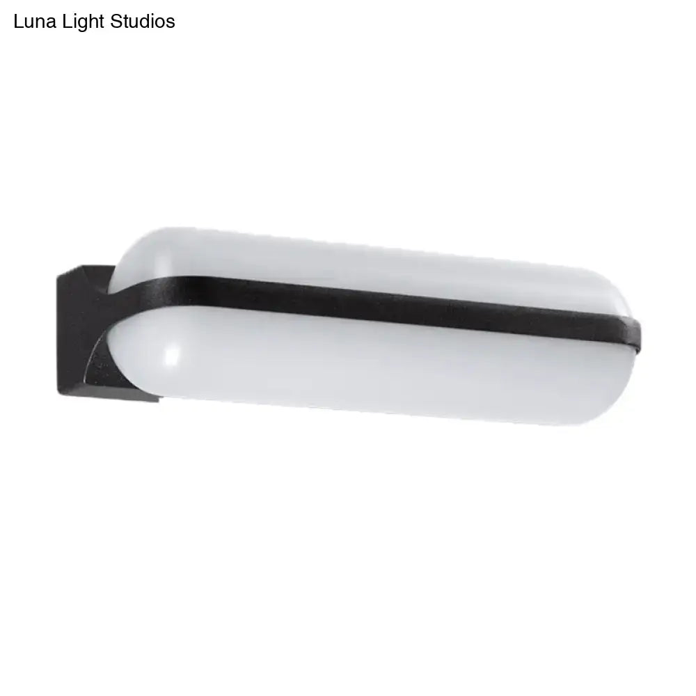 Modern black capsule flush wall sconce wall-mounted lamp with frosted white diffuser and sleek metal frame for bedroom lighting