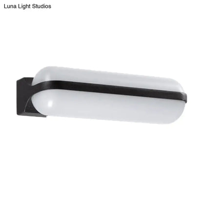 Modern black capsule flush wall sconce wall-mounted lamp with frosted white diffuser and sleek metal frame for bedroom lighting