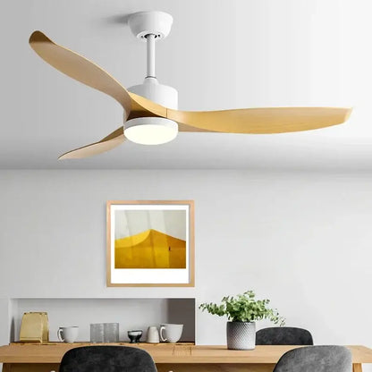 Modern black ceiling fan with remote control featuring three light-colored wooden blades and a white central housing
