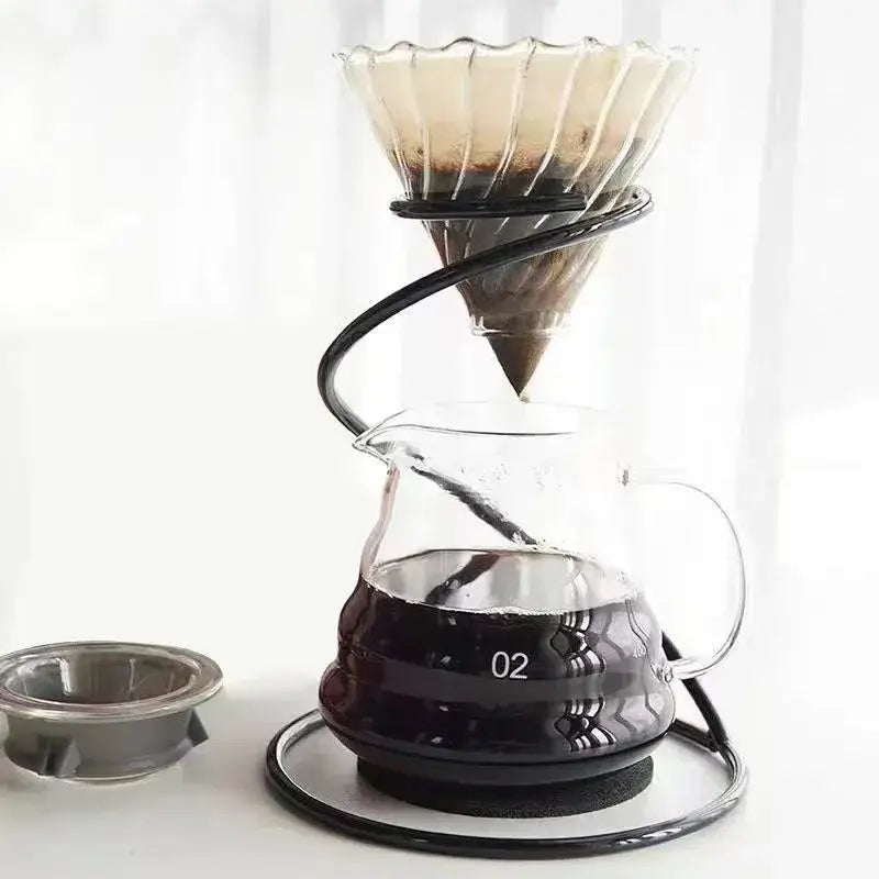 Clear glass pour-over coffee dripper with black ceramic decorbites coffee barista set and spiral metal stand
