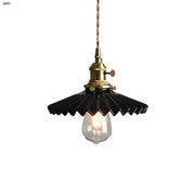 Modern black ceramic led pendant light with brass-finished socket and twisted cord for decorbites black ceramic decor
