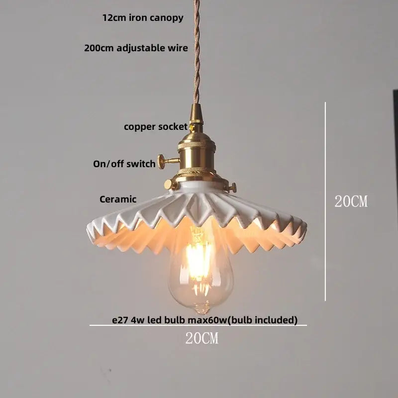 Vintage-style pendant light with scalloped white porcelain shade and brass details for decorbites black ceramic led decor