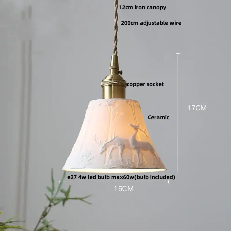 Modern black ceramic led pendant light with white ceramic embossed deer design and brass-finished metal decorbites black ceramic