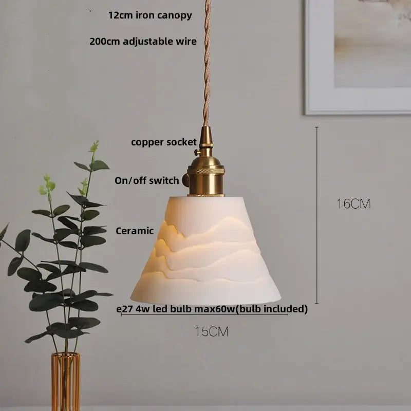 Modern black ceramic led pendant light with white textured mountain design and brass detail for decorbites pendant light use