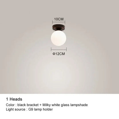 Modern black chandelier with gold frosted glass globe and black bracket featuring milky white glass lampshade decorbites black chandelier