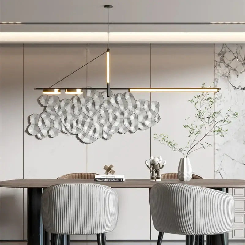 A modern black chandelier pendant light with metallic angular design hangs above the dining table decorbites black chandelier