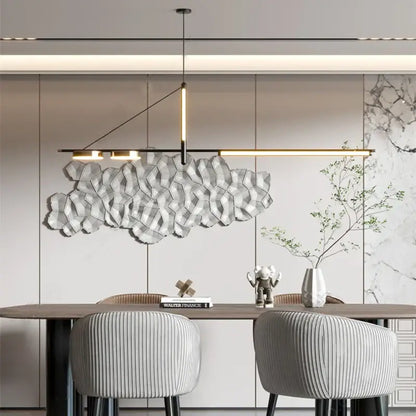 A modern black chandelier pendant light with metallic angular design hangs above the dining table decorbites black chandelier