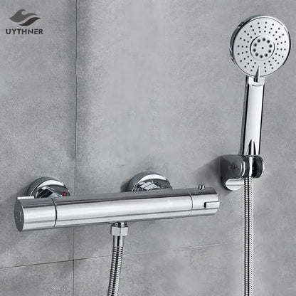 Modern black and chrome brass shower set with chrome finished handheld nozzle and integrated temperature control valve decorbites black chrome