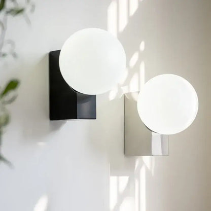 Modern black and chrome glass ball wall sconce with frosted white spherical shades for bedroom decorbites glass ball light