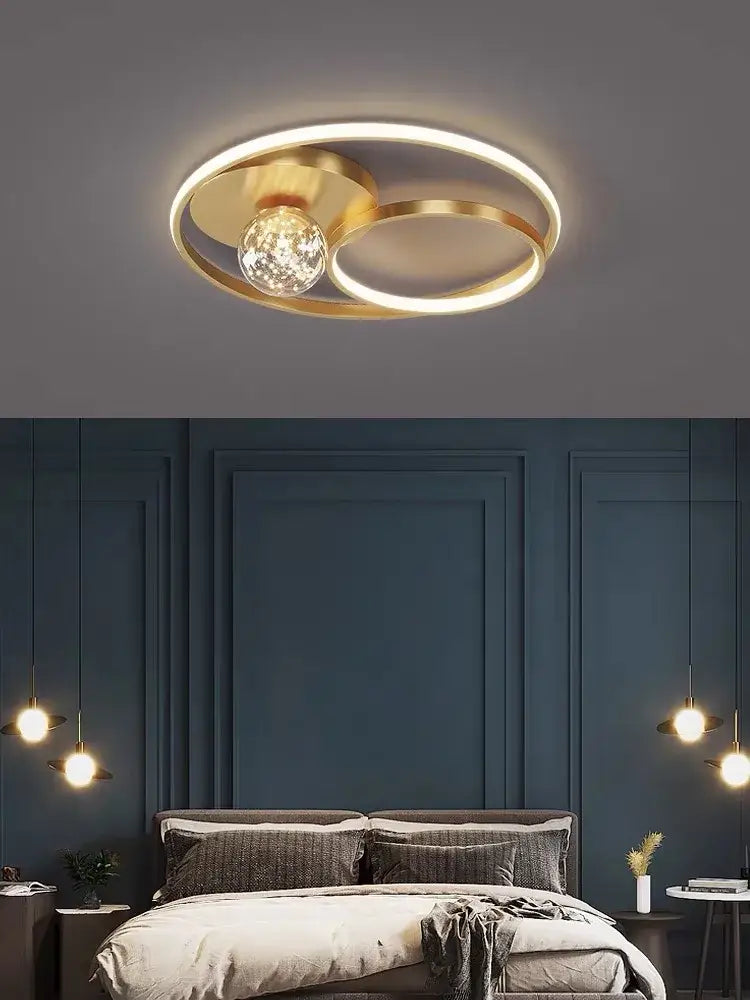 Modern black and chrome decorbites gypsophila chandelier with gold-toned circular ceiling light and central crystal globe