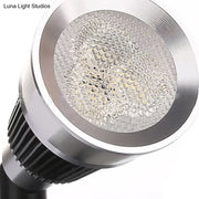 Modern black and chrome smd wall light with silver led spotlight, honeycomb diffuser, and black heat sink fins
