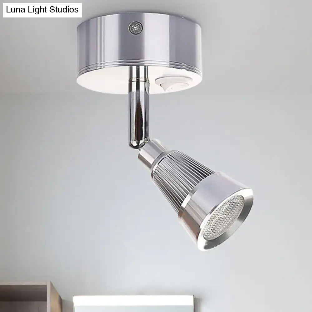 Modern black and chrome smd wall light with adjustable chrome spotlight ribbed conical head and mesh diffuser