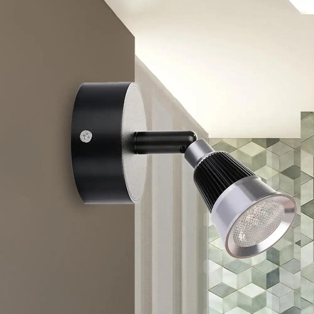 Modern black and chrome smd wall light with adjustable spotlight and ribbed heat sink for bedroom use