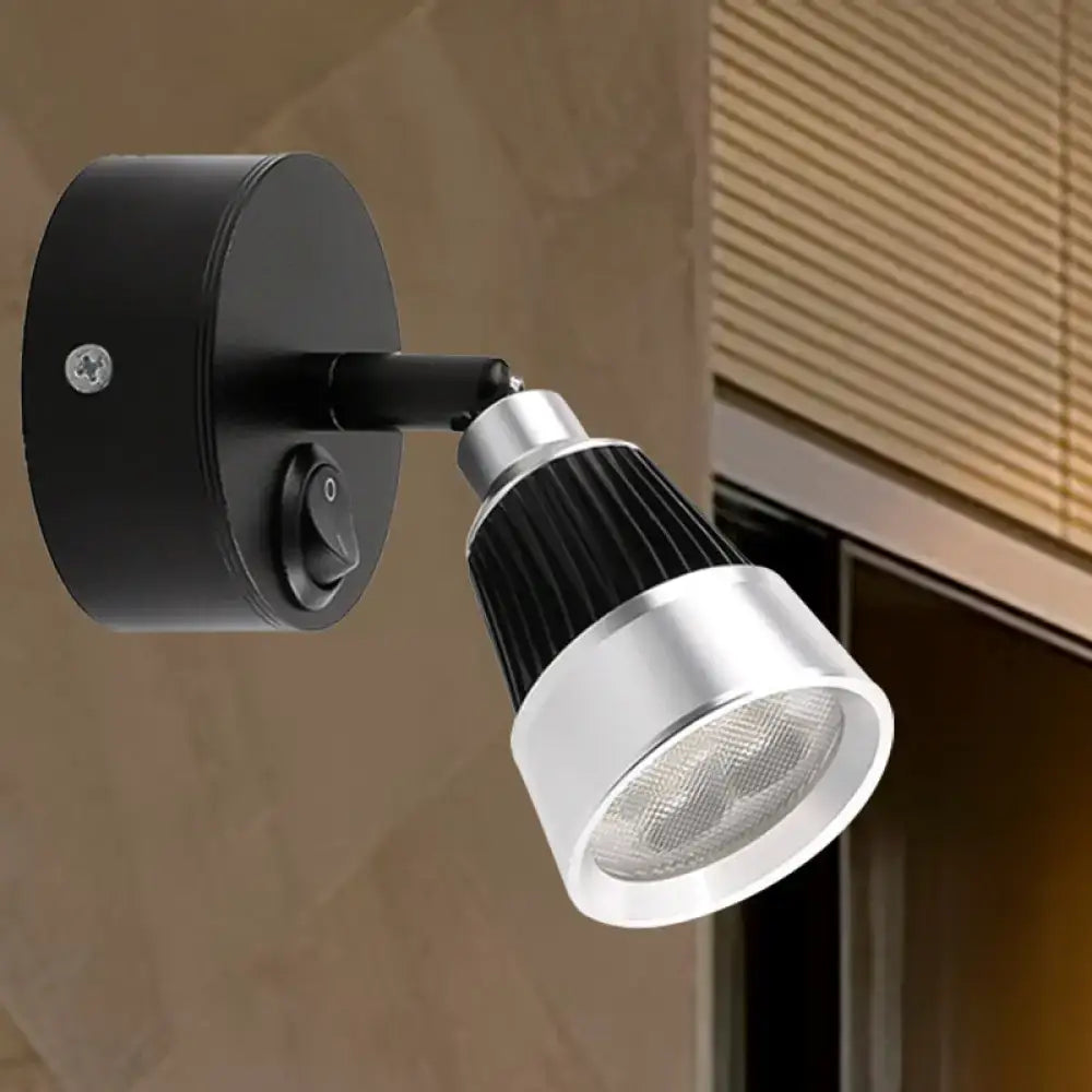 Modern black and chrome smd wall light with adjustable led spotlight and textured black heat sink for bedroom use