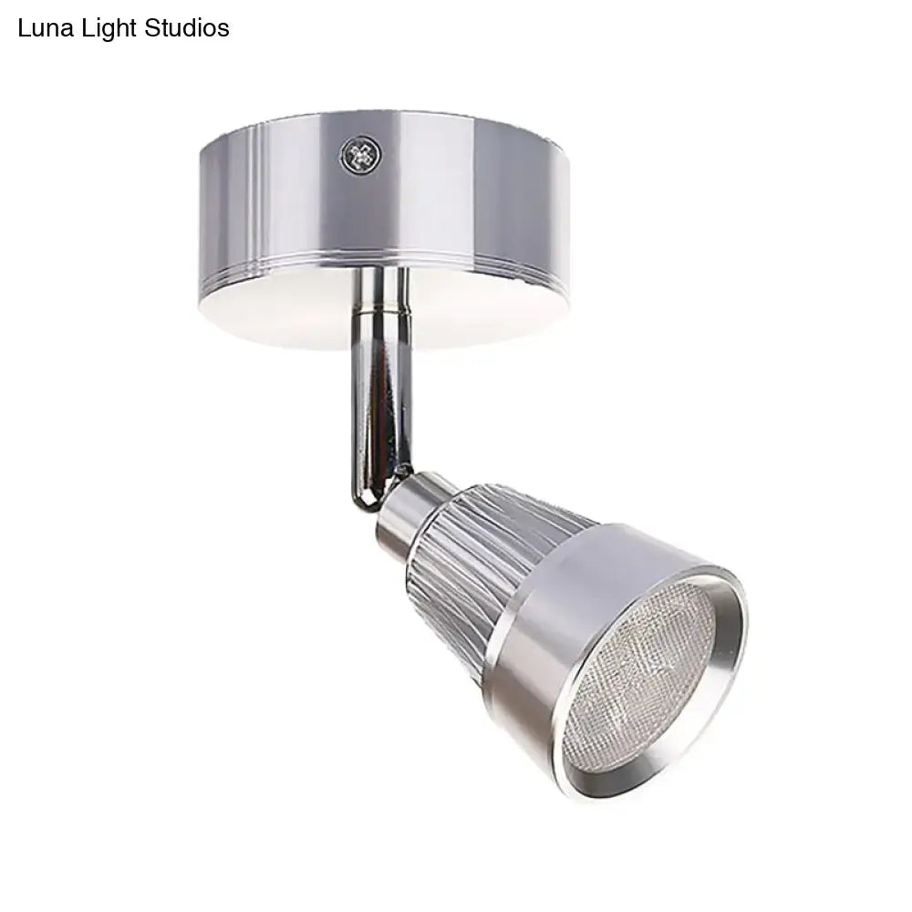 Modern black chrome smd wall light with chrome finish adjustable spotlight and sleek circular mounting base