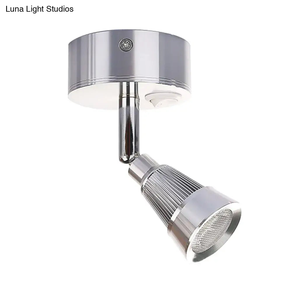 Modern black and chrome smd light wall light with adjustable led spotlight and sleek ribbed diffuser for bedroom use