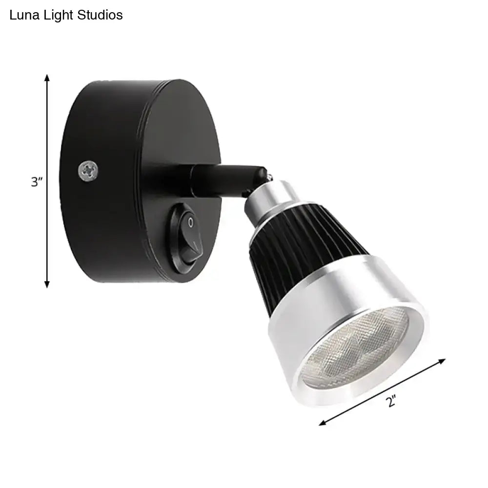 Modern black chrome smd wall light featuring adjustable spotlight with ribbed heat sink for bedroom use