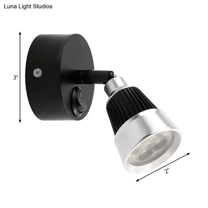 Modern black chrome smd wall light featuring adjustable spotlight with ribbed heat sink for bedroom use