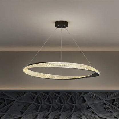 Modern black circle chrome chandelier pendant light with sleek black and gold frame and warm led woven texture glow