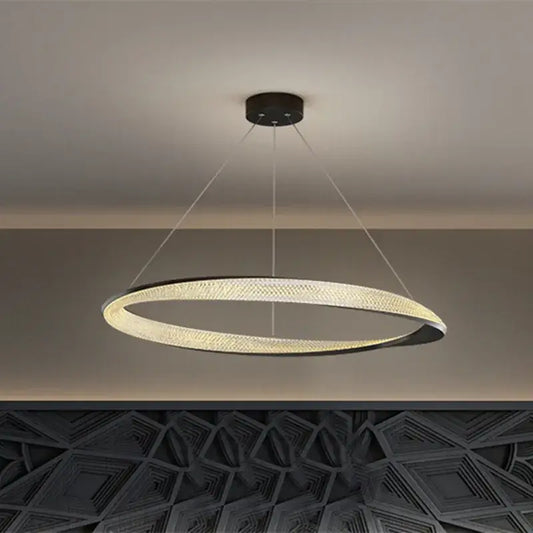 Modern black circle chrome chandelier pendant light with sleek black and gold frame and warm led woven texture glow