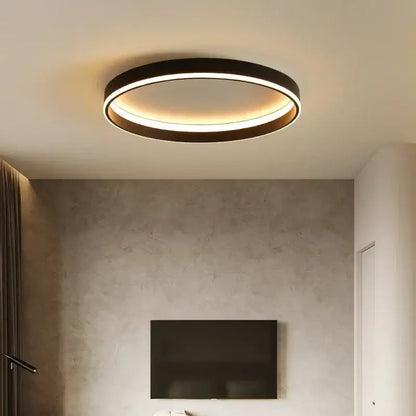 Modern black circular led ceiling light with sleek frame and warm ambient glow for living room decorbites circular led ceiling lights