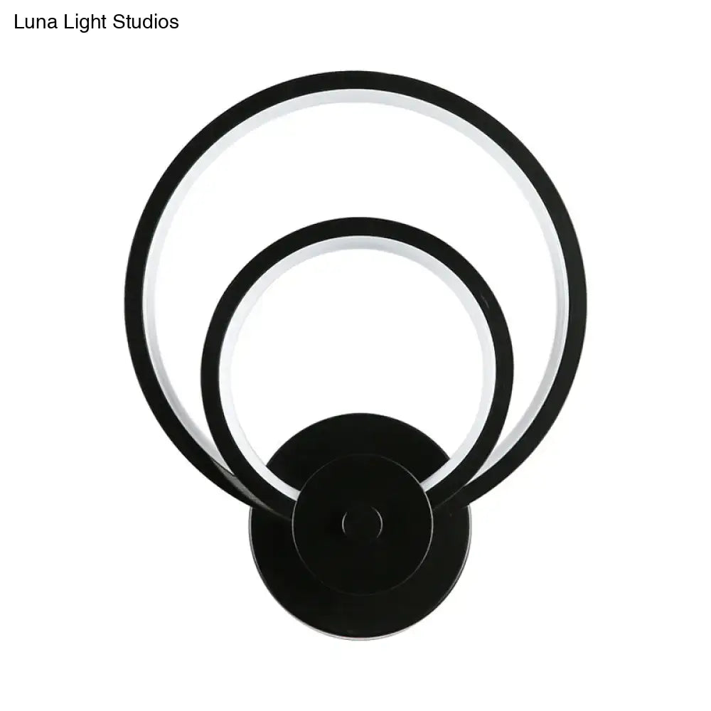 Modern black circular led light fixture with two concentric rings and remote control for bedroom wall sconce use