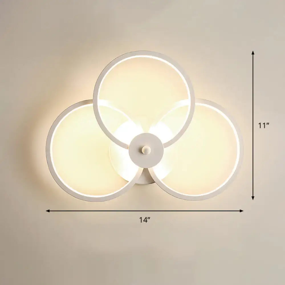 Modern black circular led light fixture with three overlapping illuminated rings wall sconce with remote control