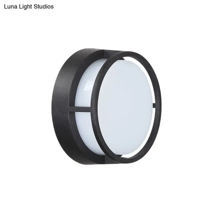 Modern black circular led wall lamp with matte finish frosted glass panel providing warm color outdoor lighting