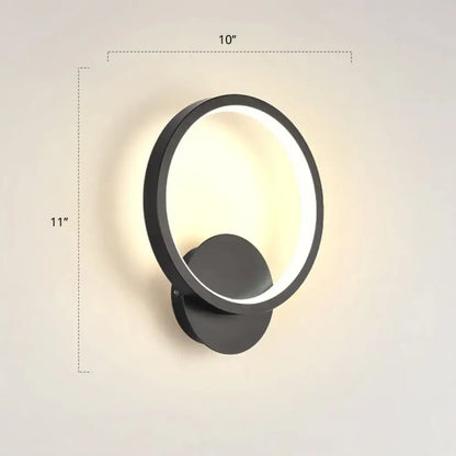 Modern black circular led wall sconce light fixture with glowing ring and minimalist design inches high for bedroom use
