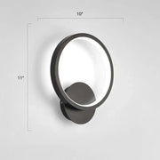 Modern black circular led wall sconce light fixture with a sleek minimalist design and illuminated ring, inches high