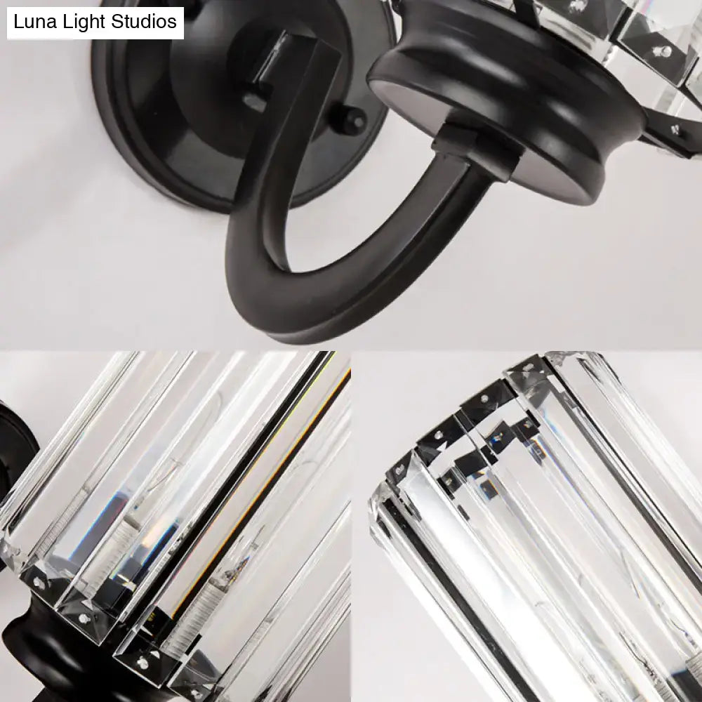 Modern black clear crystal drum wall lamp featuring a wrought iron sconce with clear crystal prisms for living room use