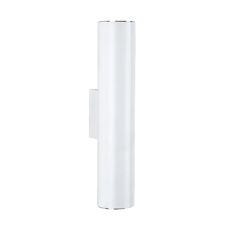 Modern black cob led wall lamp featuring a white cylindrical up down sconce with metallic accents for decorbites cob led