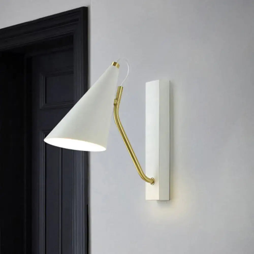 Modern white cone shade wall sconce with gold brass arm mounted on white plate suitable for led incandescent fluorescent lighting