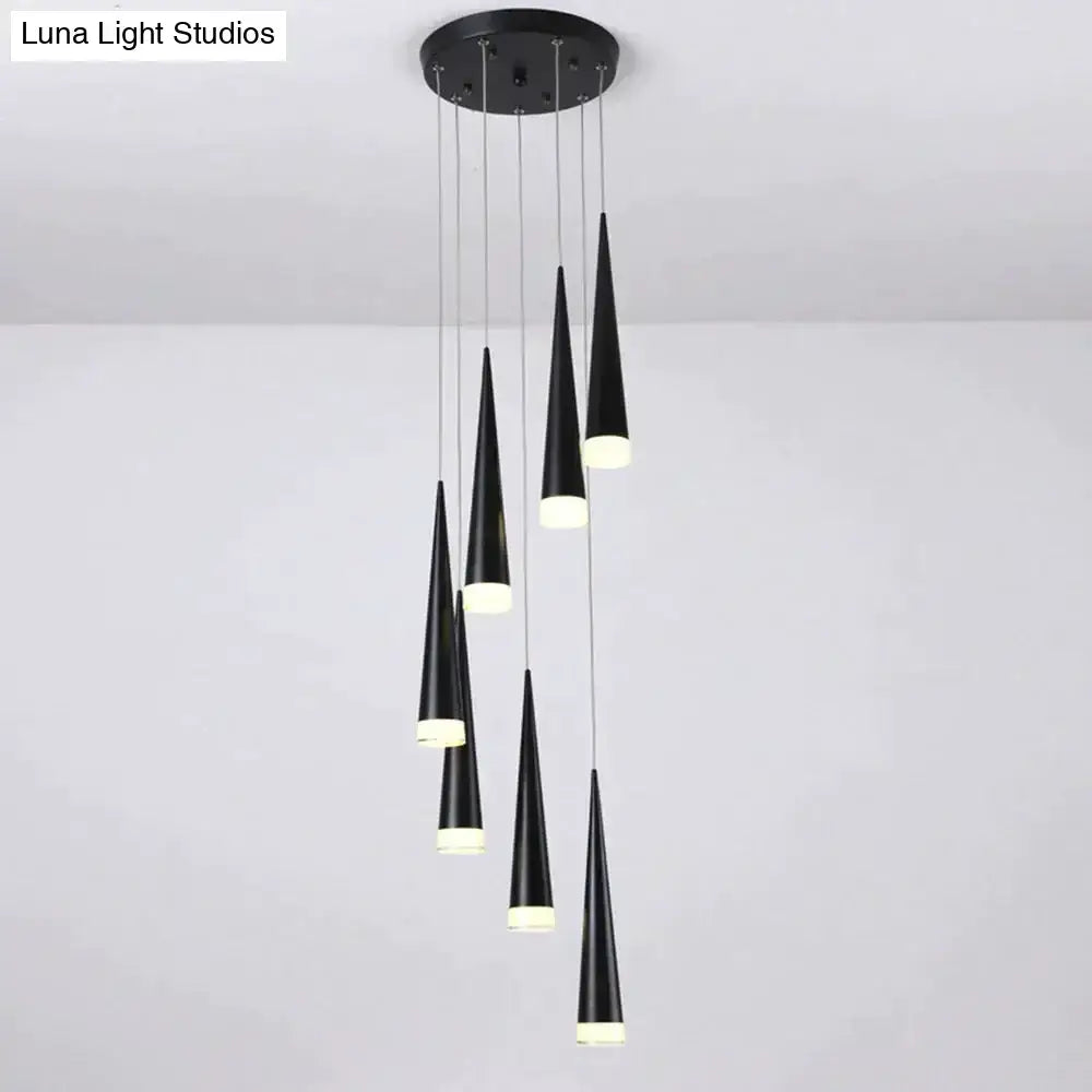 Modern black conical led pendant lamp with frosted glass bases hanging from circular ceiling mount for kitchen island