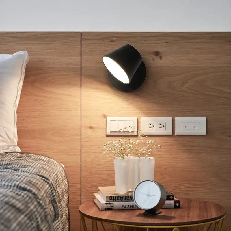 Modern black conical led wall lamp with sleek design for bedroom reading lighting and wall lamp functionality