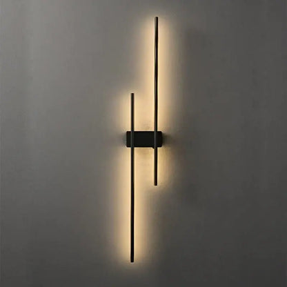Modern black copper wall lamp with two vertical illuminated bars and central mounting plate for minimalist bedroom decor