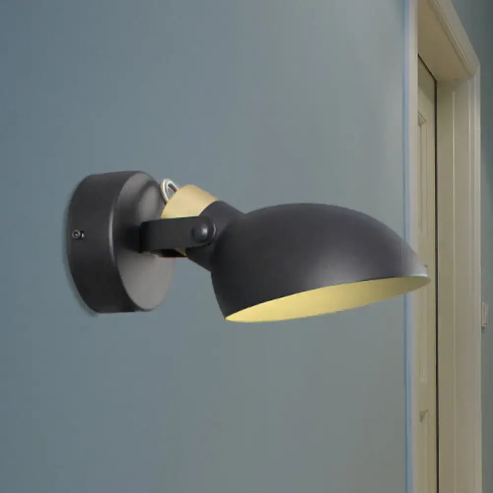 Modern black and cream adjustable wall sconce light with matte finish for bedroom use