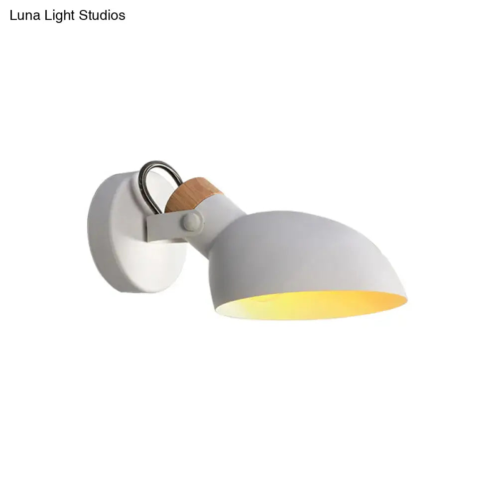 Modern black and cream adjustable wall sconce light with white matte finish and wooden accent for bedroom lighting