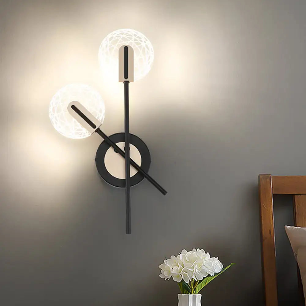 Modern black metal wall light with two warm white spherical woven glass shades suitable for 220v-240v use