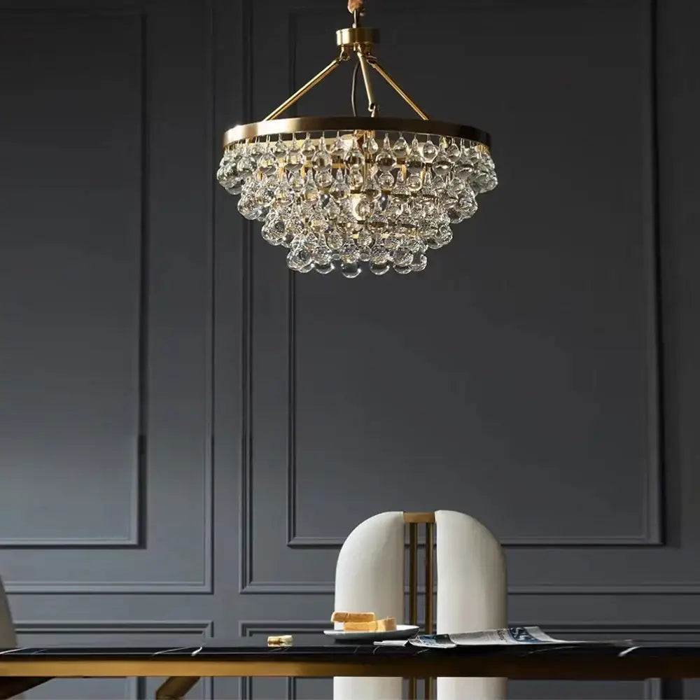 A luxurious gold-toned chandelier with cascading clear crystal droplets for modern black crystal bead decorbites ceiling