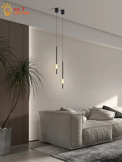 Minimalist modern black crystal bedroom pendant lights with warm glowing orbs for elegant decorbites crystal bedroom decor