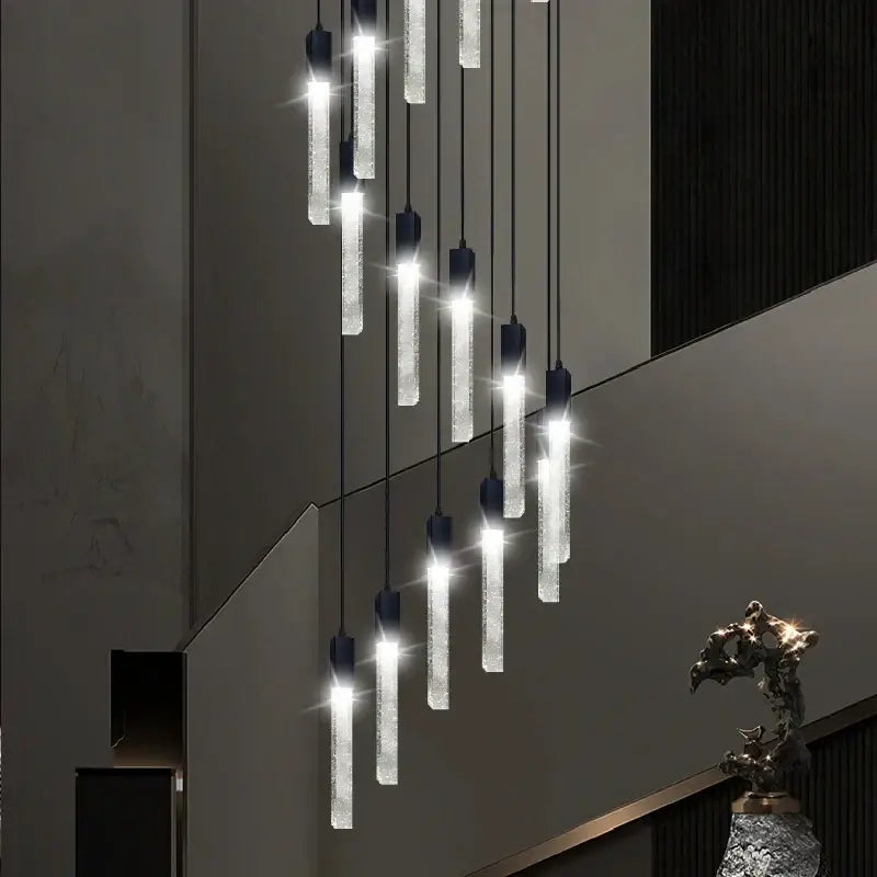 Modern black crystal bubble chandelier pendant light with clear textured glass cylinders and dark metal fixtures for staircase decorbites crystal bubble design