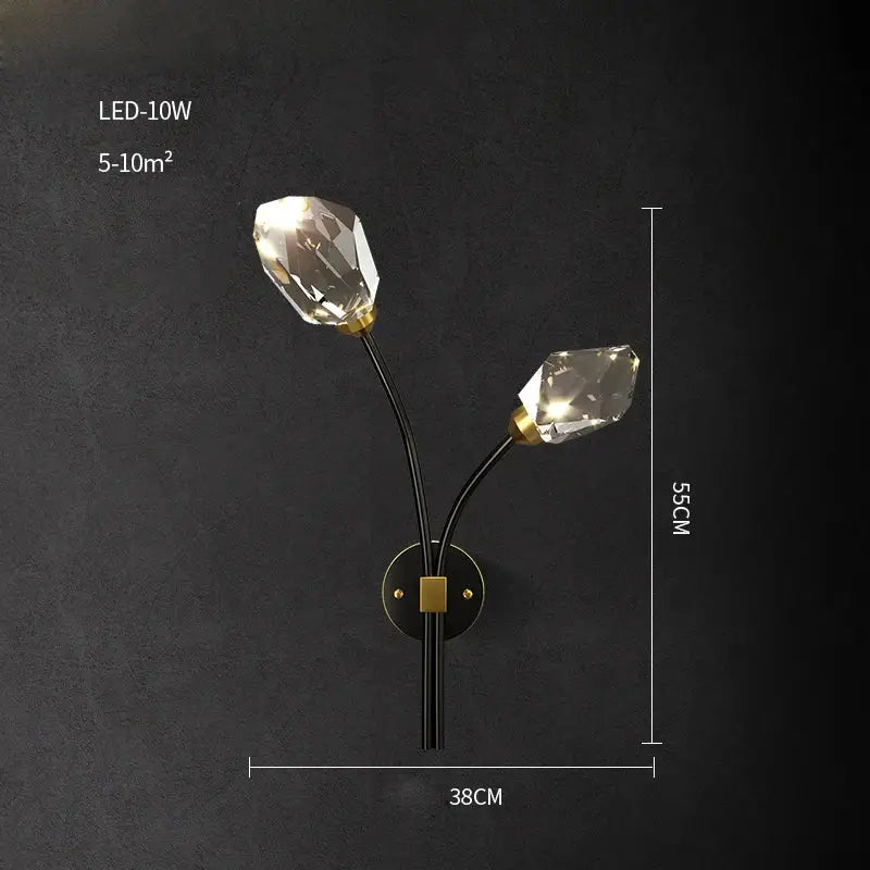 Modern black crystal copper led chandelier featuring a sleek black wall sconce with faceted crystal bulbs and gold accents