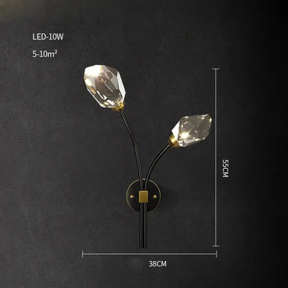 Modern black crystal copper led chandelier featuring a sleek black wall sconce with faceted crystal bulbs and gold accents