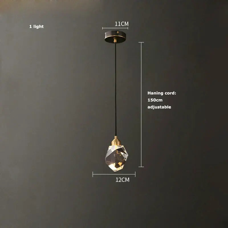 A modern black crystal copper led chandelier with a clear faceted glass globe and brass accents for dining room decorbites black crystal