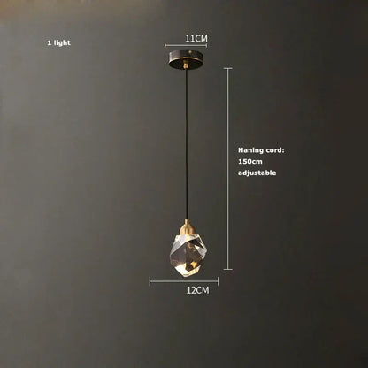 A modern black crystal copper led chandelier with a clear faceted glass globe and brass accents for dining room decorbites black crystal