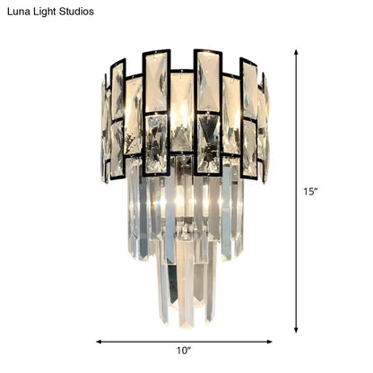 Modern black wall sconce with crystal embedded cascading prisms and metal frame for 110v-120v or 220v-240v lighting